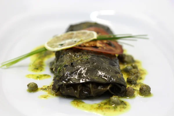 Stuffed flounder grape leaves — Stock Photo, Image