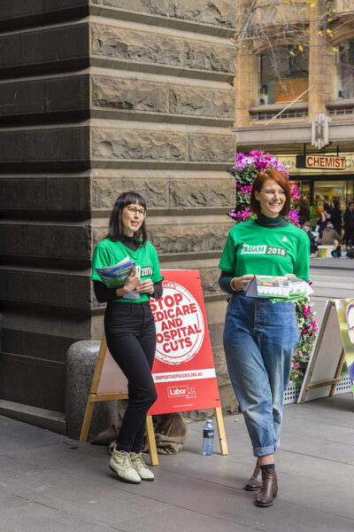 Two volunteers at Melbourne Town Hall for federal election