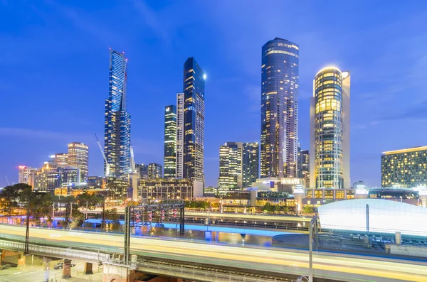 Modern buildings with light trail in Australia at twilight — Stock Photo, Image