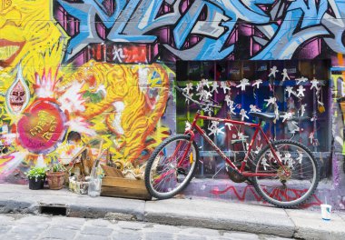 Bicycle parked in the Hosier Lane in Melbourne clipart