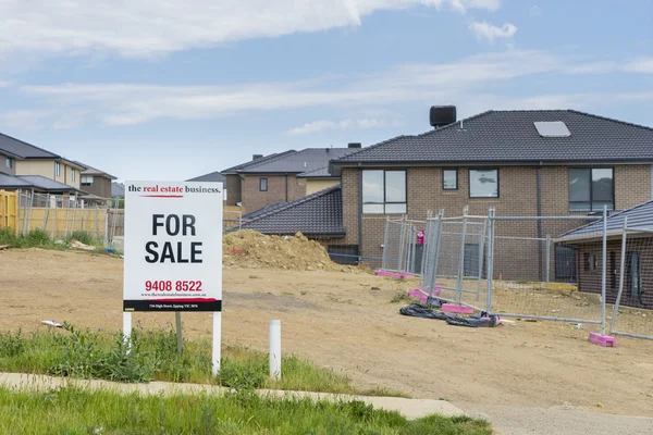 Ekran oustide boş arazi Melbourne için Satılık işareti