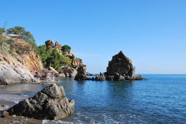 Cozy beaches on the rocky shores of Sicily