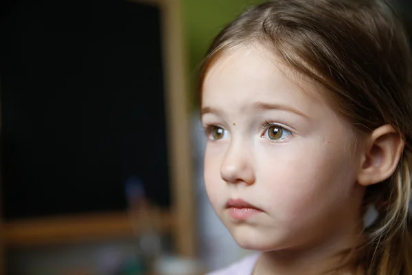 Thoughtful and sad little girl — Stock Photo, Image