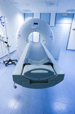 CT (Computed tomography) scanner in hospital clipart