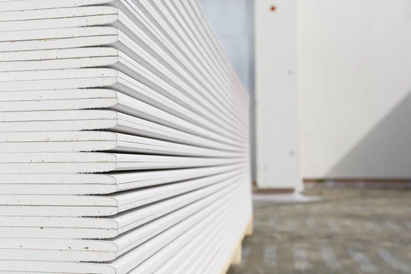 Stack of plasterboard panels — Stock Photo, Image