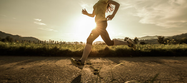 Fit woman running fast