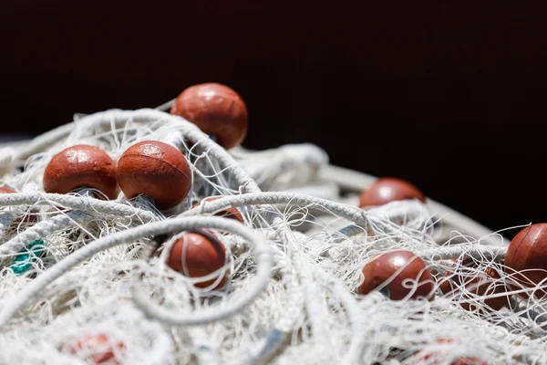 Fishing net with red floats background — Stock Photo, Image