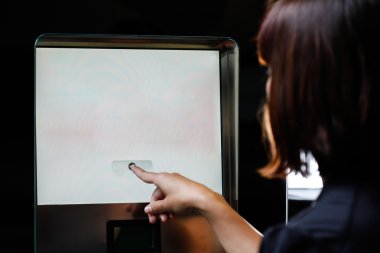 Woman touching the screen  clipart