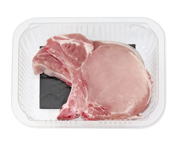 Chuletas de cerdo en bandeja —  Fotos de Stock