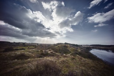 sand dunes with sky and clouds