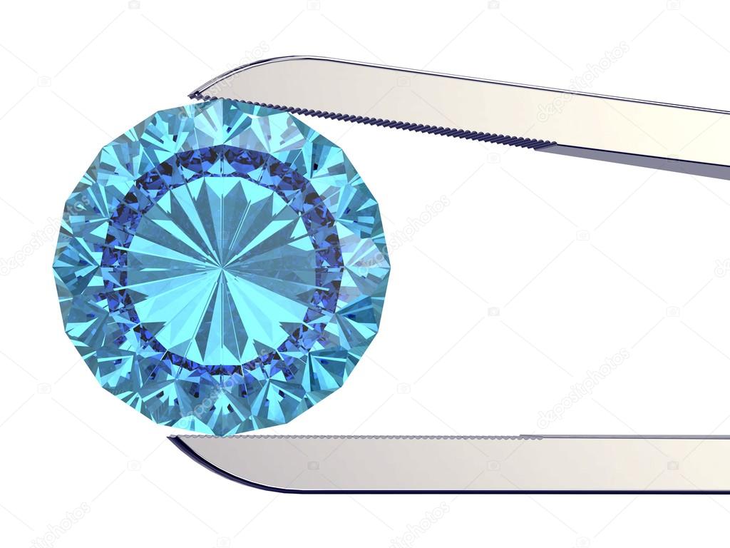 gem stone in tweezers isolated on a white background