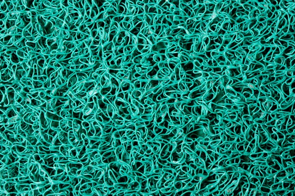 Yeşil renkli sentetik halı deseni