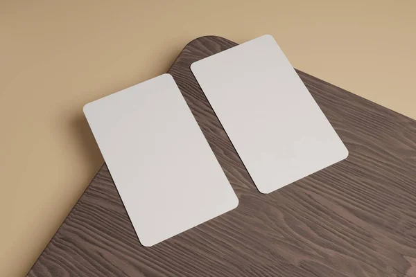 Kahverengi bir tahta parçasında üç boyutlu iki kartvizit çizimi. Bu sizin, şirketinizin ya da diğerlerinin kimliklerini göstermek için kullanılabilir..