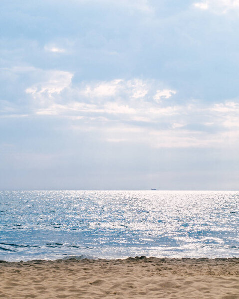 Blue sea in the rays of sunset