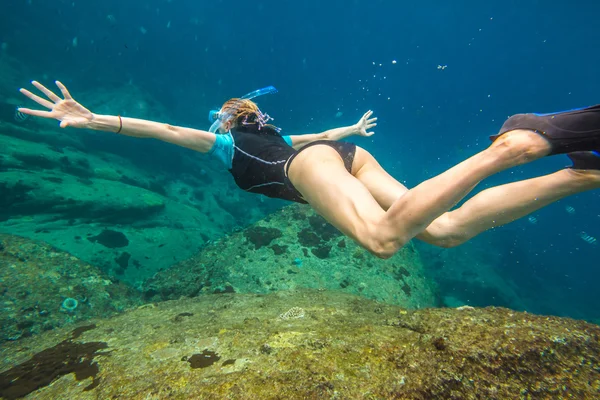 Woman free diving