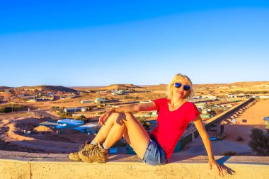 Tourist woman in Coober Pedy clipart