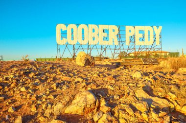 Coober Pedy wellcome sign at sunset clipart
