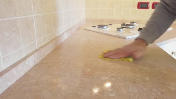 Polishing liquid sanding a kitchen top — Stock Video