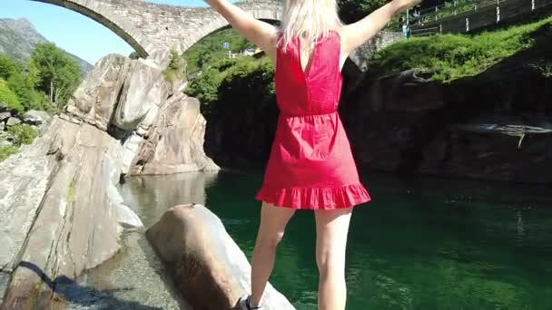 Woman relaxing at Ponte dei Salti Bridge — Stock Video