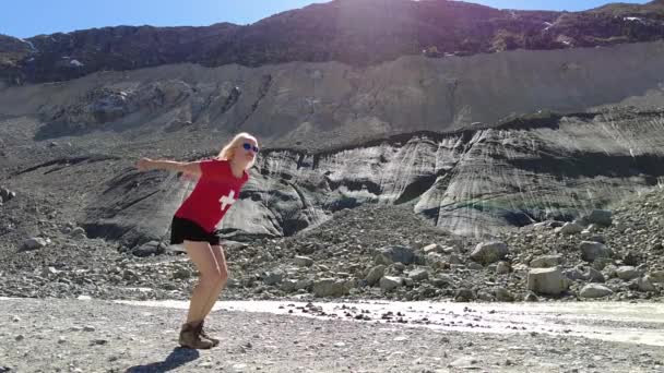Girl jumping in Morteratsch glacier — Video