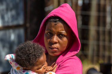 African girl with baby