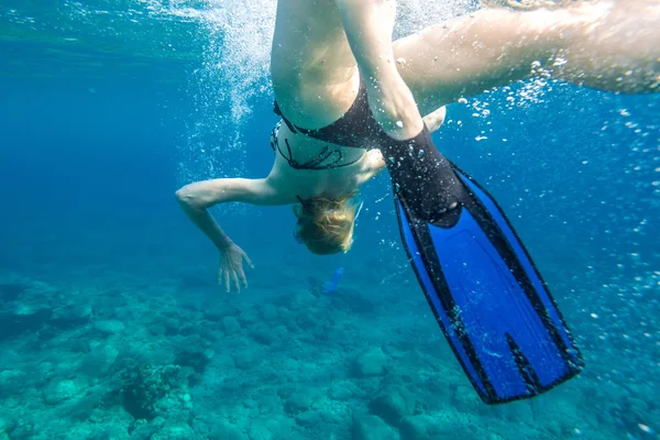 A Female snorkeling — Stok fotoğraf