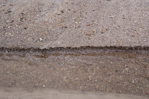 Sand and water flow — Stock Photo, Image