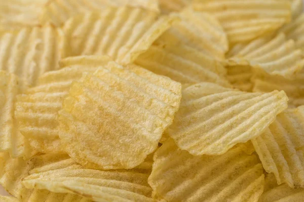 Kartoffelchips aus nächster Nähe. Bio-Lebensmittel. Lebensmittel-Hintergrund. Makro — Stockfoto