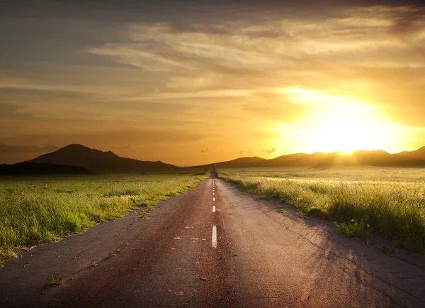 Rural Road Fiery Sunset — стокове фото