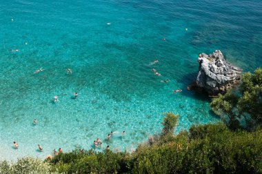 bathers to the sea