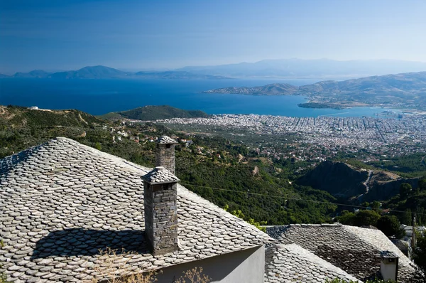 foreground stone roof and background bay