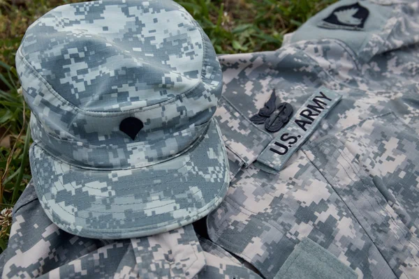 Military cap and uniform — Stock Photo, Image