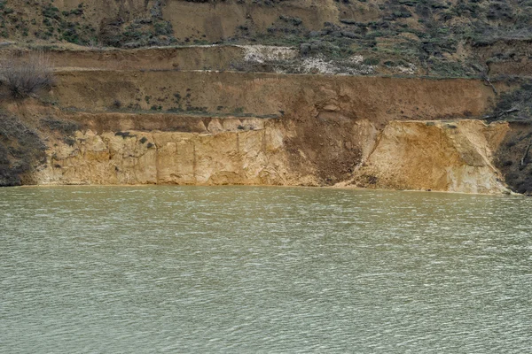 Old sunken mine silica sand with a layered coast 06