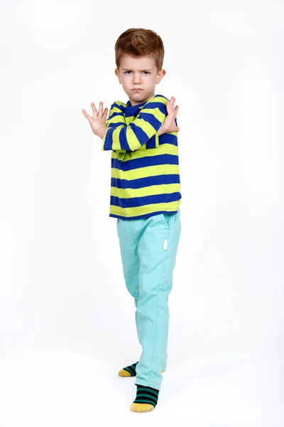 Cute boy with a angry expression
