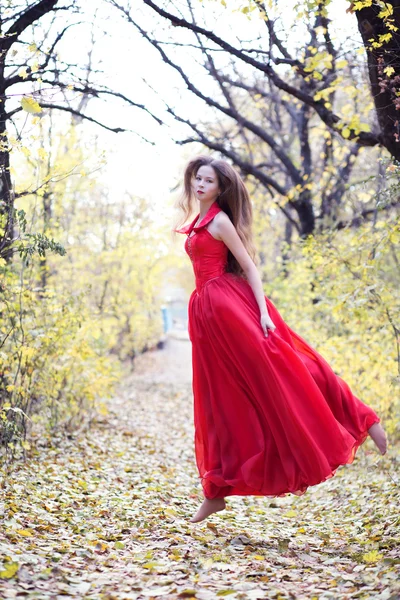 Girl red long dress — Stock Photo, Image
