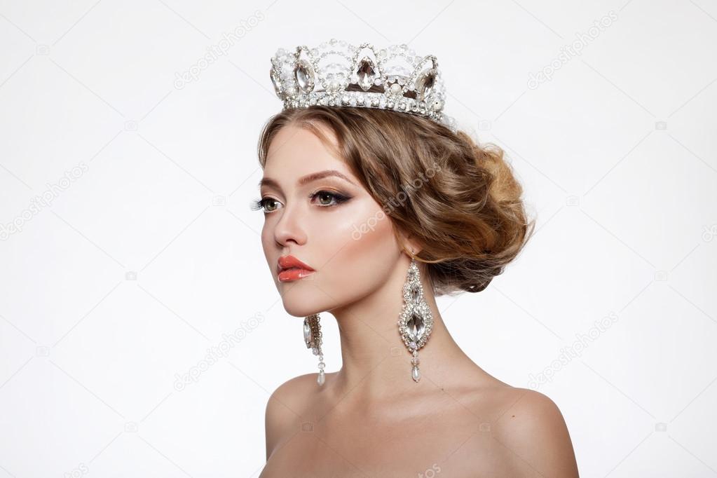 Young beautiful woman in crown