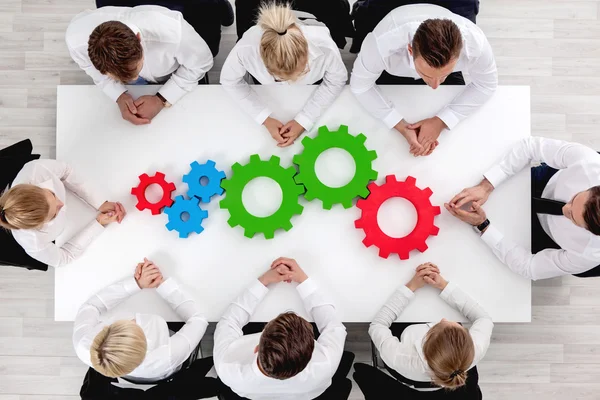 Teamwork with cogs of business — Stock Photo, Image