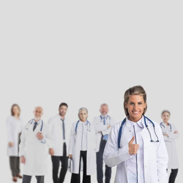 Gesundheitswesen Und Medizinisches Konzept Gruppe Von Ärzten Auf Grauem Hintergrund — Stockfoto