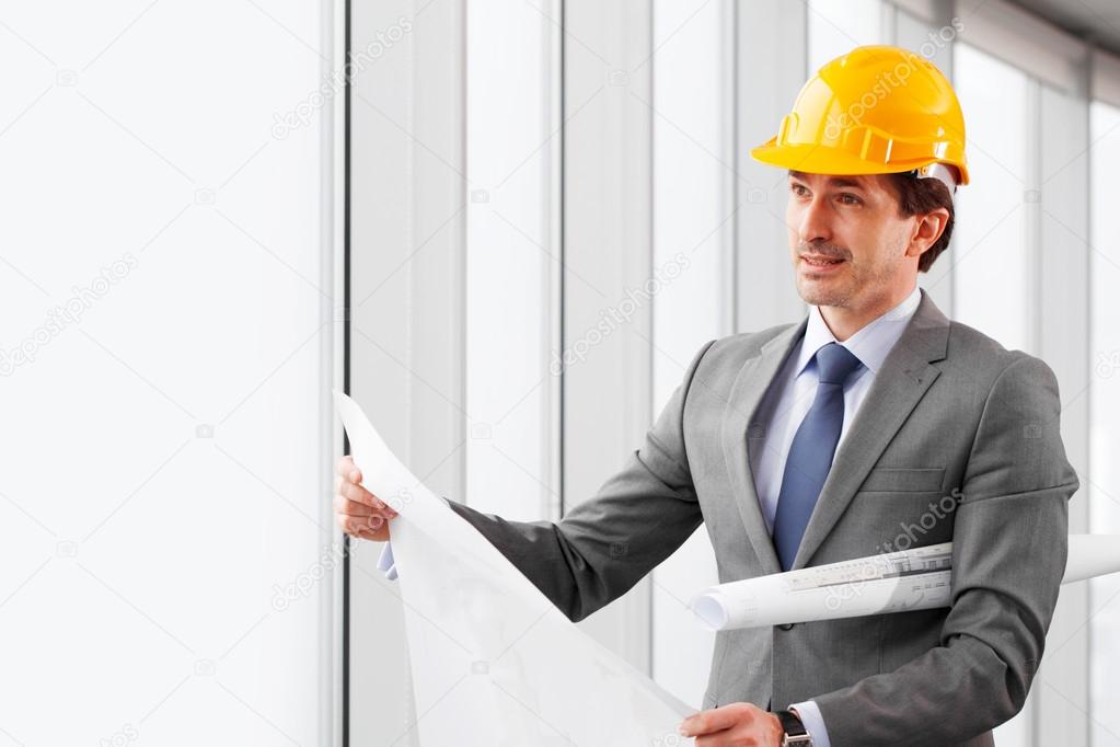 businessman in construction helmet