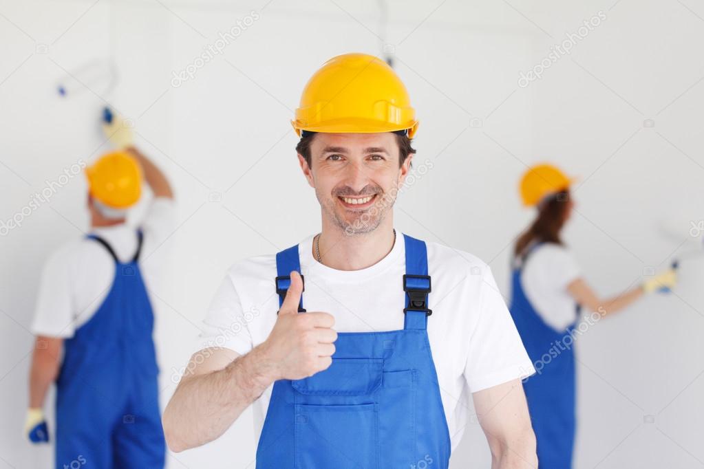 workman gives thumbs up