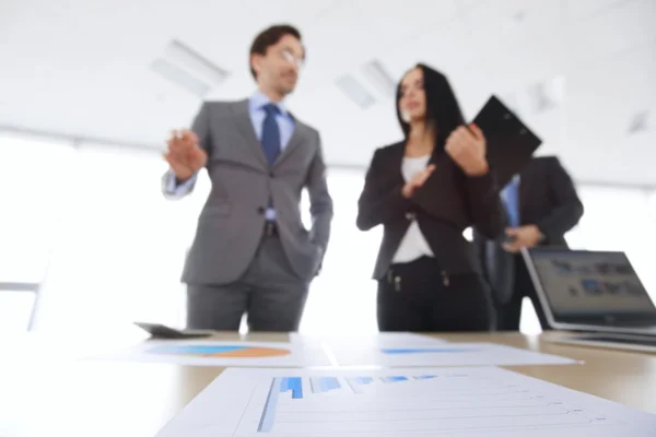 Business people discuss reports — Stock Photo, Image