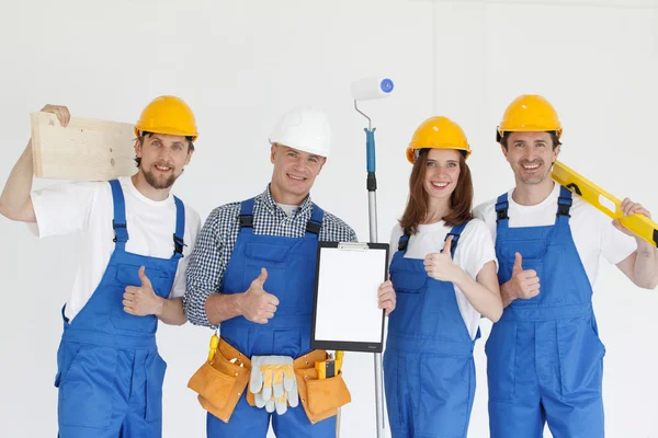 Groupe de constructeurs souriants — Photo