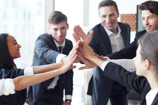 Business team making high five — Stock Photo, Image