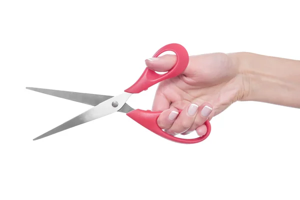 Red scissors in hand. — Stock Photo, Image