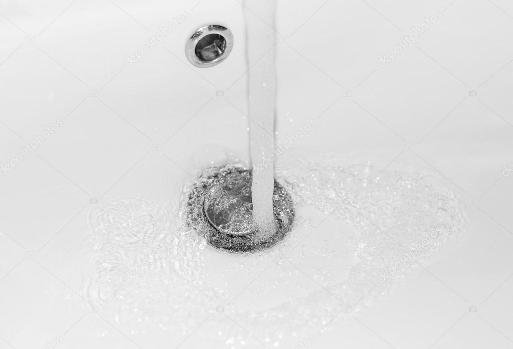 The water flows from faucet. Stock Photo by ©tanya.rozhnovskayagmail