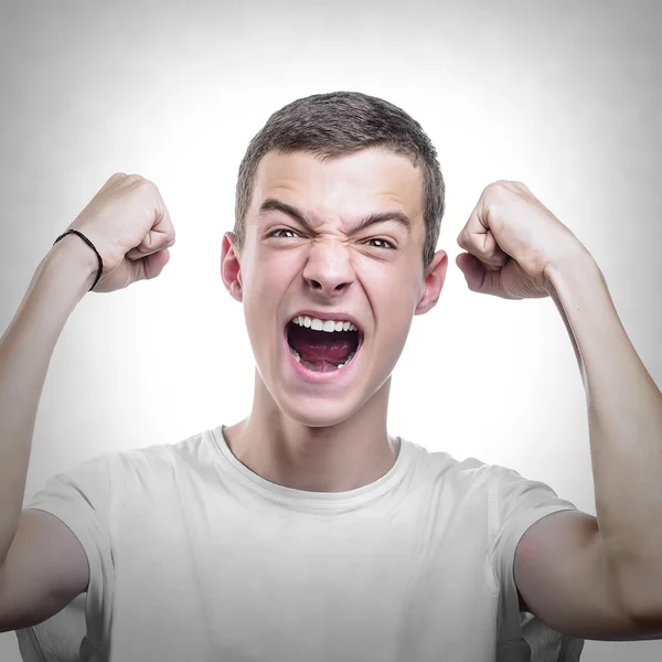 Young man celebrating success. — Stock Photo, Image