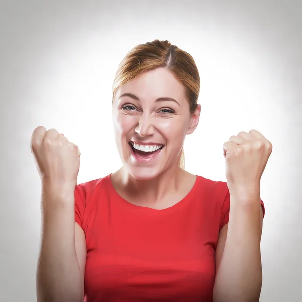 Blonde woman celebrating success