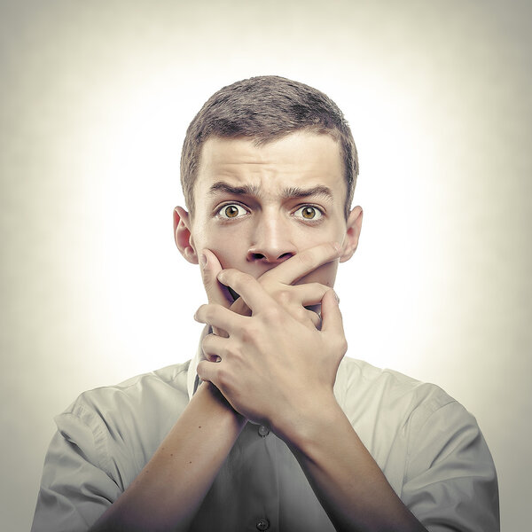 Portrait of amazed man.