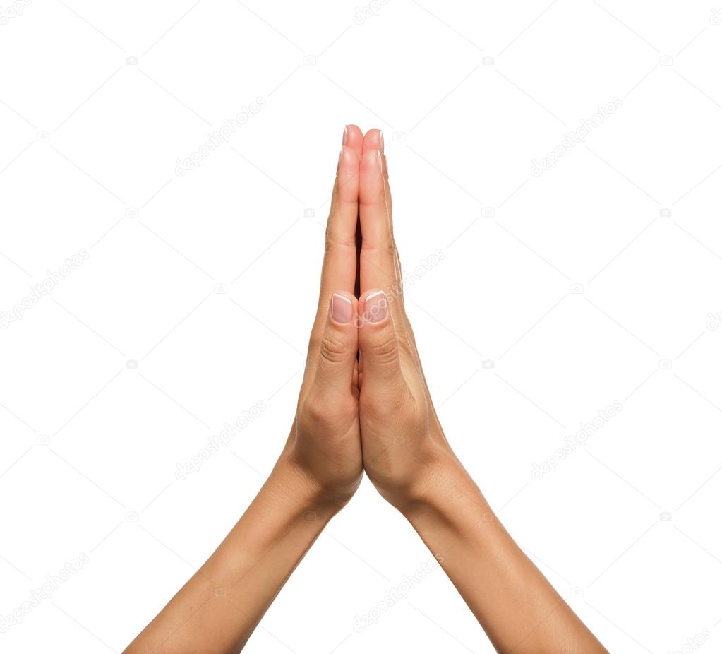 Praying hands of a woman.