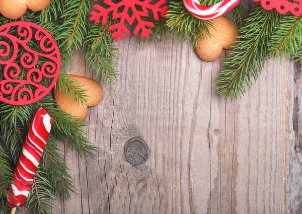 Marco de Navidad en una textura de madera . — Foto de Stock